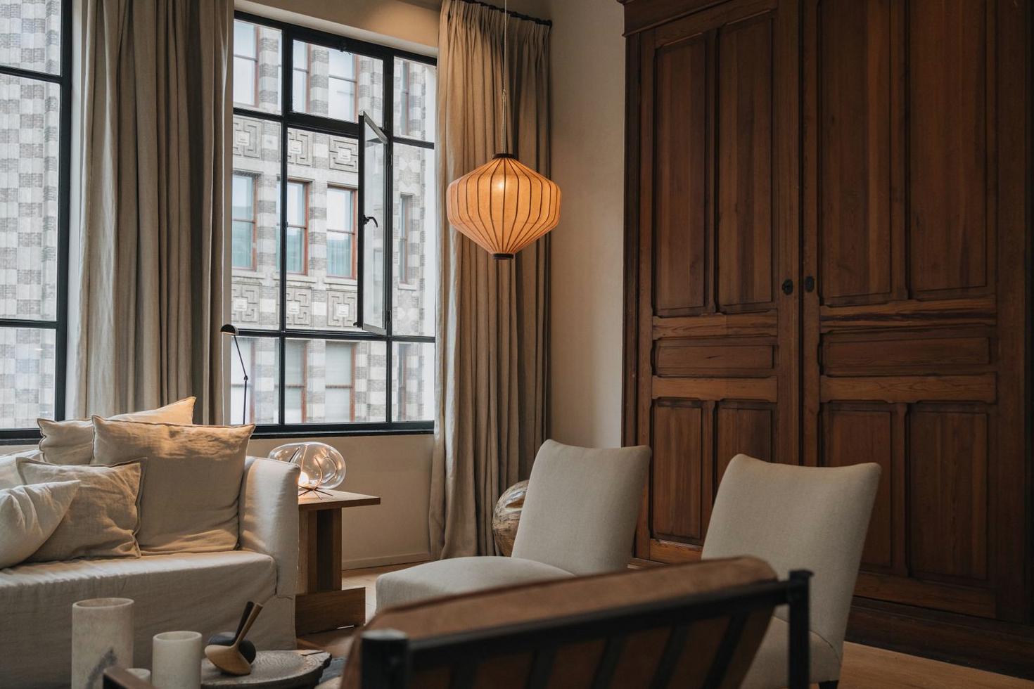 Pleasant communal area with natural light and functional furniture