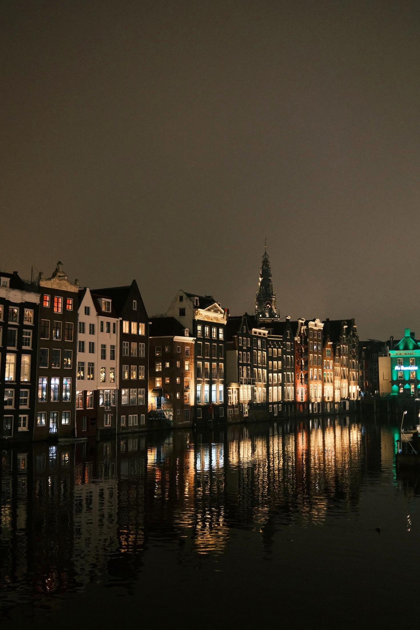 Twilight view of Clearledgerlabs Hotel on the Prinsengracht canal